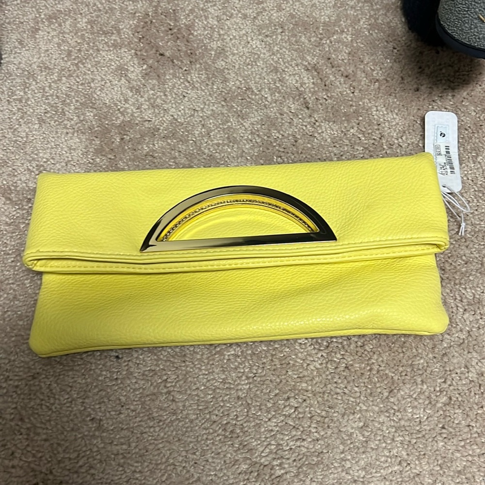 Yellow hand bag. Charming Charlie